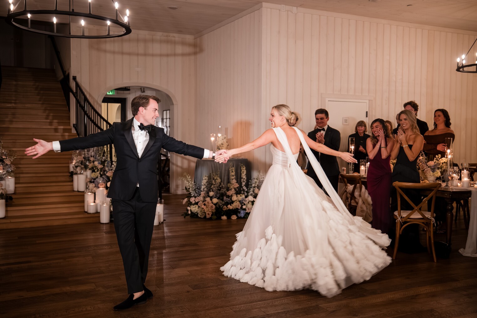 Couple twirling during their first dance